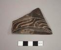 Deeply incised black potsherd from a straight-sided bowl