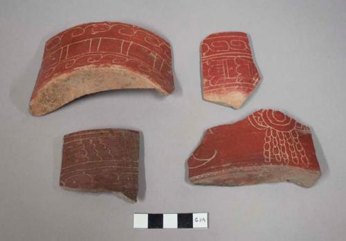 Incised red potsherds