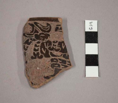 Incised potsherd