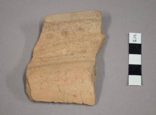 Rim potsherd - incised decoration in band on outside, slightly curved lip