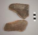 Potsherds with horizontal markings and root impressions on inside