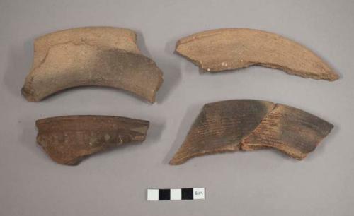 Potsherds, eight restored