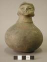 Ceramic effigy vessel, human form