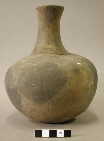 Ceramic vessel with long neck.