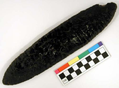 Chipped implement; chipped from black obsidian