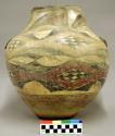 Pottery olla. Globular, red ware, cream slip with designs of red, buff, black