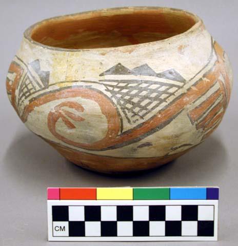 Pottery bowl with slightly constricted mouth. Black and red on white.