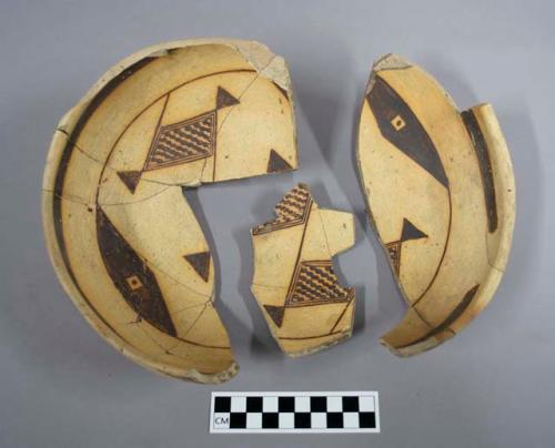 Mended bowl, black pigment interior and rim