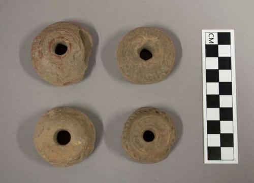 Pottery spindle whorls - stamped