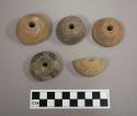 Pottery spindle whorls - incised
