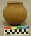 Ceramic vessel, complete, short straight neck, plain.