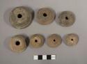 Molded pottery spindle whorls