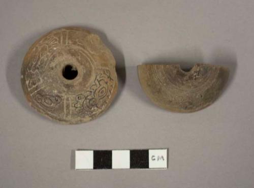 Incised pottery spindle whorl