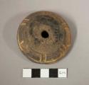 Decorated spindle whorl