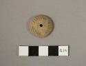 Spindle whorl - incised