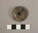 Spindle whorl - incised