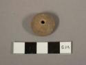 Plain pottery spindle whorl