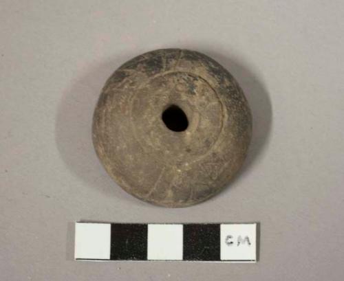 Terra cotta spindle whorl