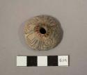 Molded pottery spindle whorl