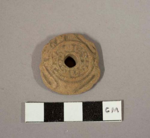 Spindle whorl - stamped