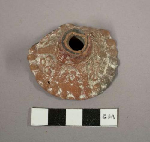 Ceramic spout with molded designs