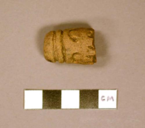 Ceramic, cylindrical stamp end, incised geometric design, broken