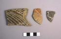 Ceramic body sherds with incised exterior design