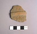 Fragments of incised and grooved pottery