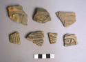 Ceramic sherds with incised and carved designs