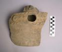 Large potsherd from a three-handled suspension bowl-incised and relief decoratio