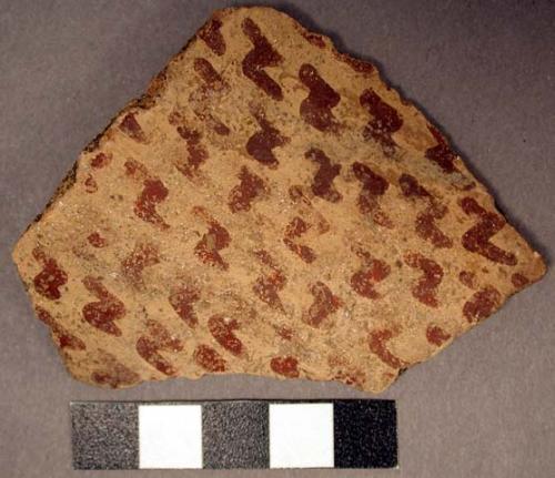 Ceramic body sherd, red on buff interior and exterior decoration