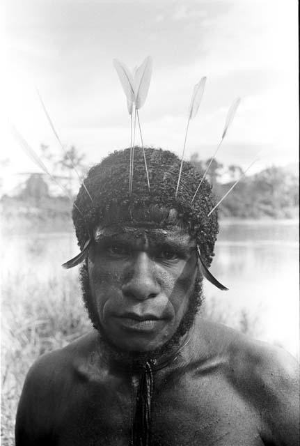 Portrait of Yegé Asuk at the Baliem with feathers in his hair