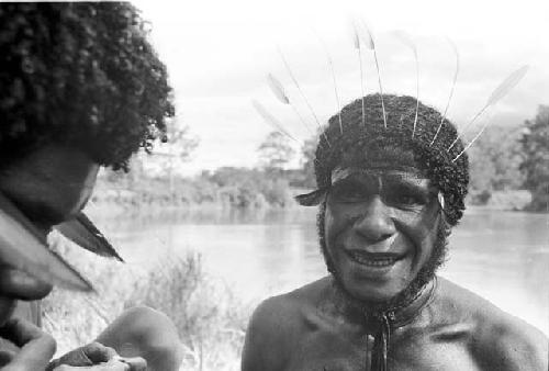 Photo of Yegé Asuk smiling with Walimo in foreground