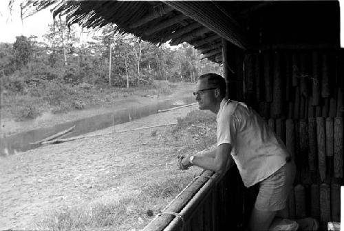 Portrait of Dr. A. A. Gerbrands leaning out of window of his house at Ammanamgai