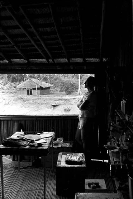 Dr. A. A. Gerbrands at a window of his house at Ammanamgai