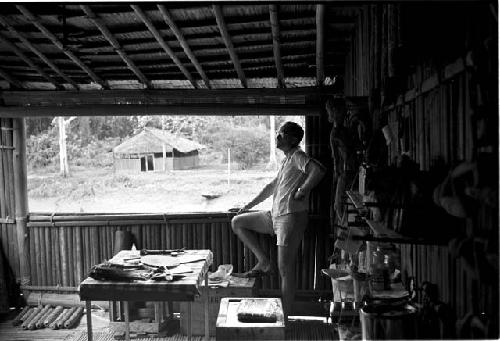 Dr. A. A. Gerbrands at a window of his house at Ammanamgai