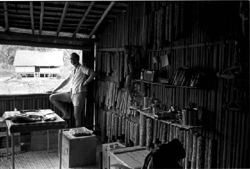 Dr. A. A. Gerbrands at a window of his house at Ammanamgai