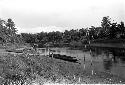 Canoes on the riverbank