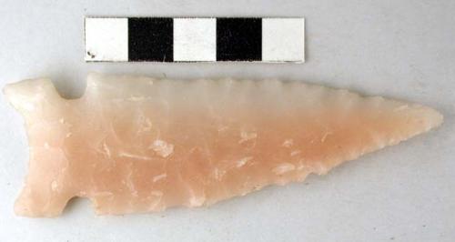 Chipped stone projectile point, side notched and concave base