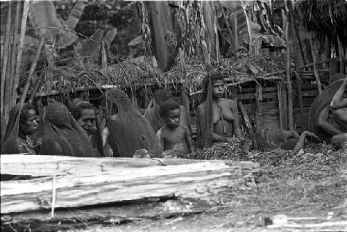 Tukom and a women's group at Yonokma's funeral, showing less grieving than another group