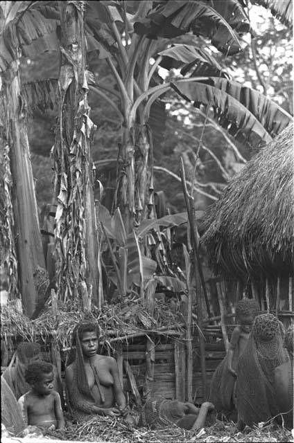 Tukom and a women's group, showing less grieving than another group