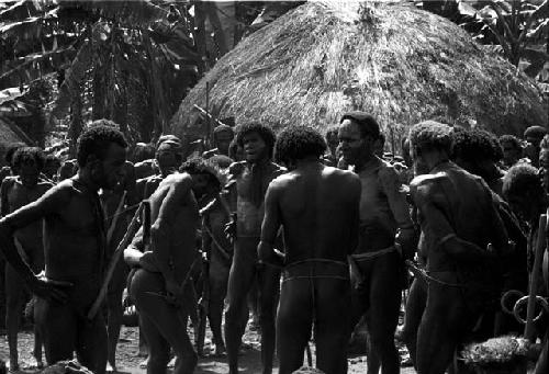 Men mourning at Yonokma's funeral