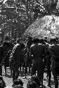 Men mourning at Yonokma's funeral