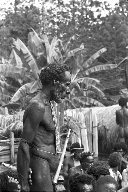 Portrait of Yohonoroik watching procedures at Yonokma's funeral