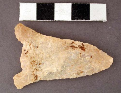 Chipped stone projectile point, corner-notched, base broken