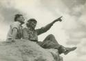 Sam Tilden and another man atop a boulder
