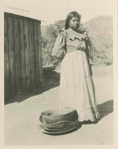 Mary Jack's daughter, young Sallie, with basket