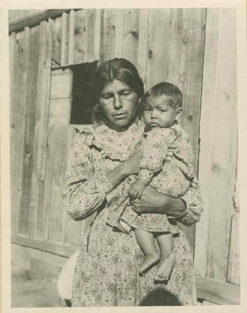 Sally and her baby wearing dresses of the same fabric