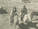 Old Gasa Maria and his wife on horses