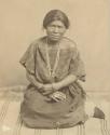 Navajo woman sitting